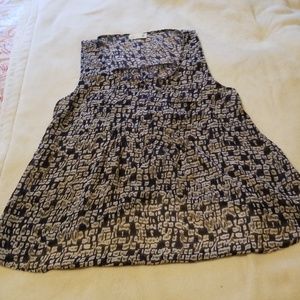 Mine....  tank with buttons and pockets